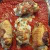 Pechugas de Pollo rellenas de mozzarella y espinacas en cama de tomate al horno